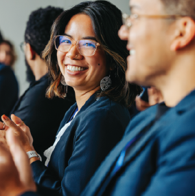 Young lady sitting in a meeting room